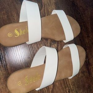 White and tan slides size 8